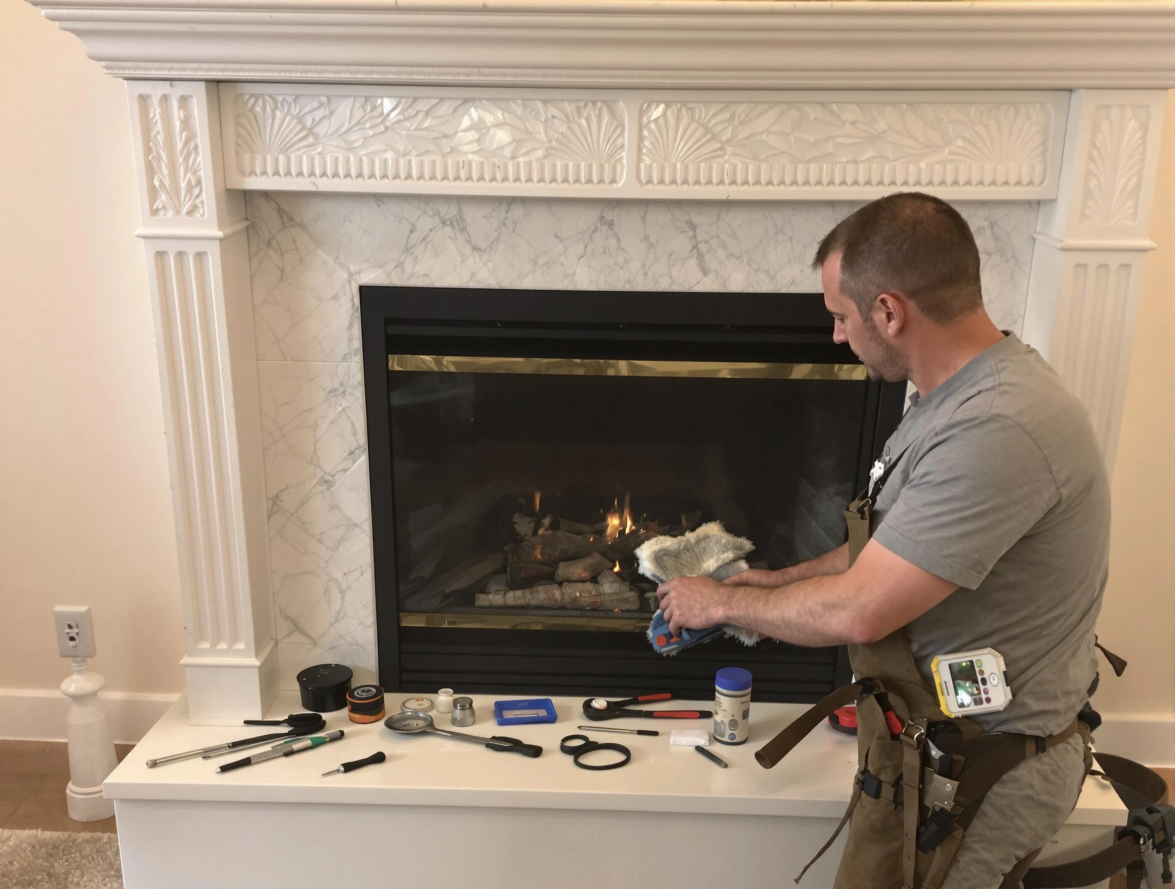 Covington Chimney Sweep performing fireplace maintenance in Covington, GA